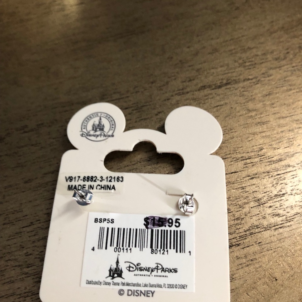 A disney birthstone earrings and necklace set.